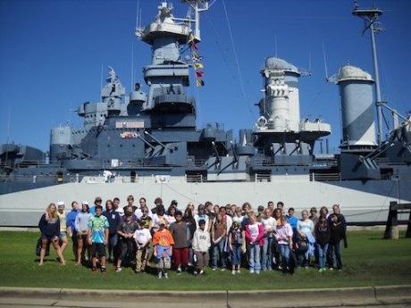 Posing with the USS Battleship North Carolina in Wilmington, 2009